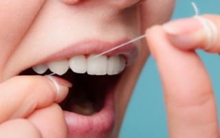Flossing Dentist in Monroe NC